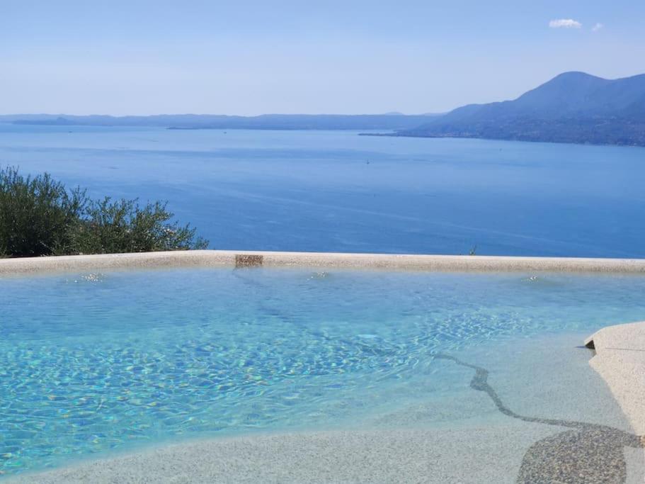 Villa Divina-Apt Armonia-Con Piscina E Vista Lago Castelletto Di Brenzone Exterior photo